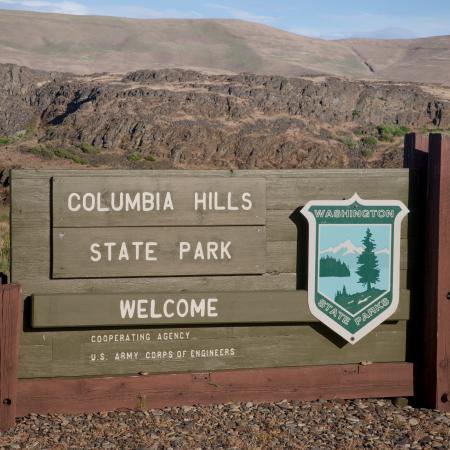 Washington State Parks sign with emblem announcing Columbia Hills entrance 