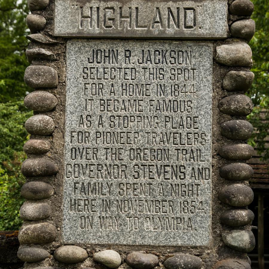 historic marker made of round stones and history of John R Jackson