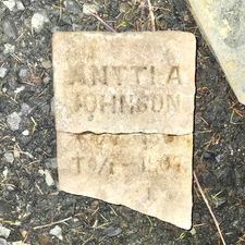 Small headstone that says "Antti A Johnson"