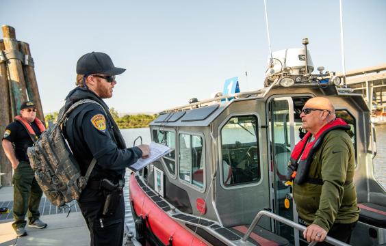 marine law enforcement officers conducting a vessel safety inspection